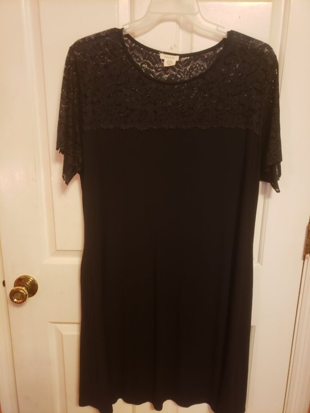 This is a Black  YELETE Dress.